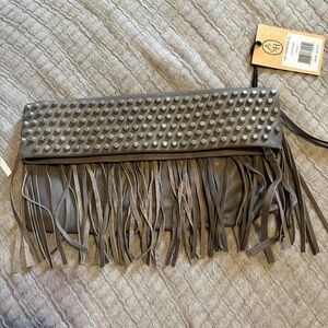 ASH FRINGES CLUTCH   gray color . leather has a little flaws